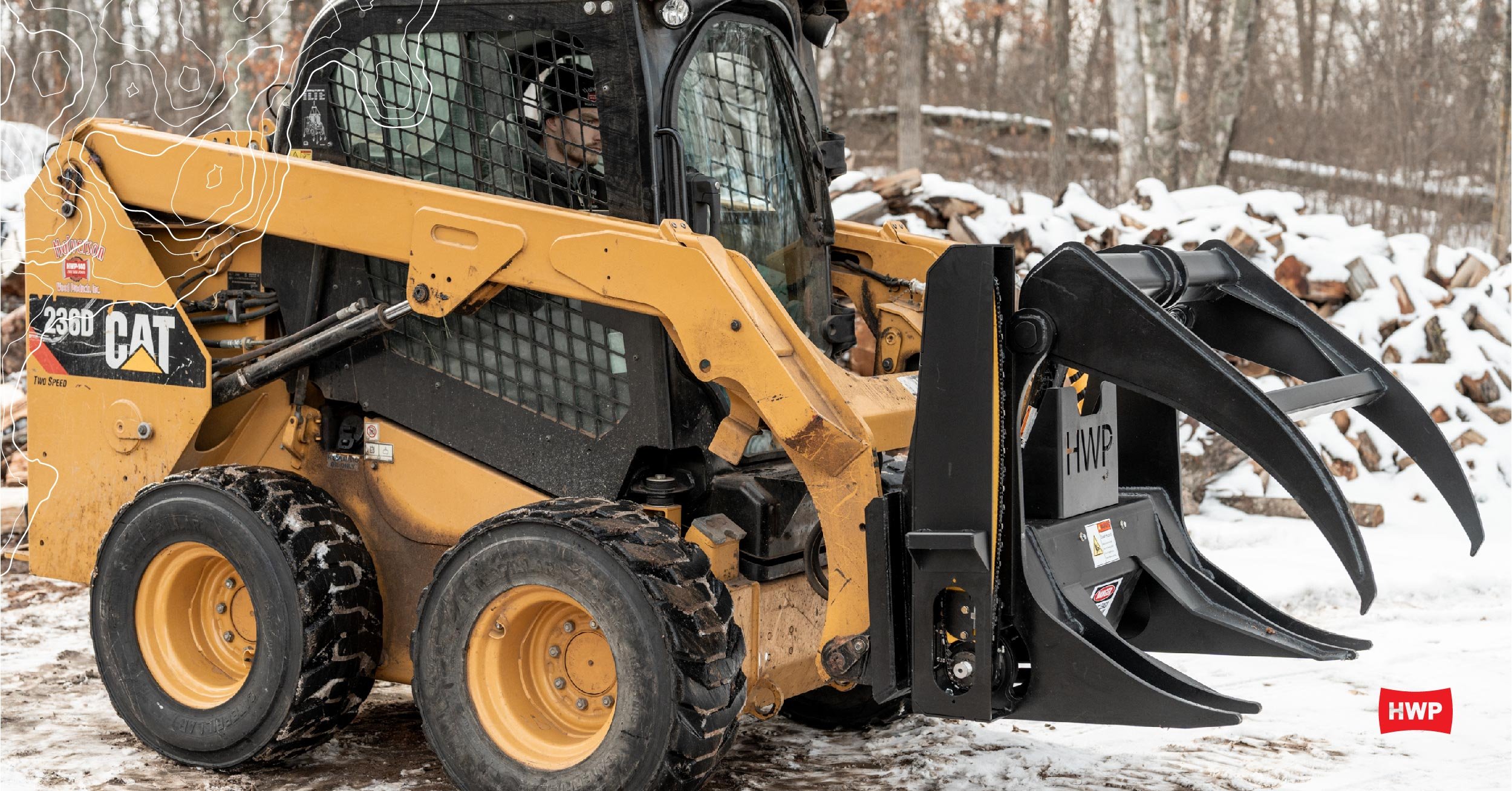 Halverson grapple attachment on a CAT skid steer