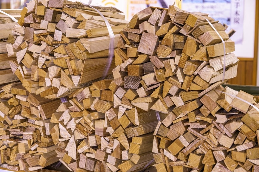 Bundles of firewood stacked up.